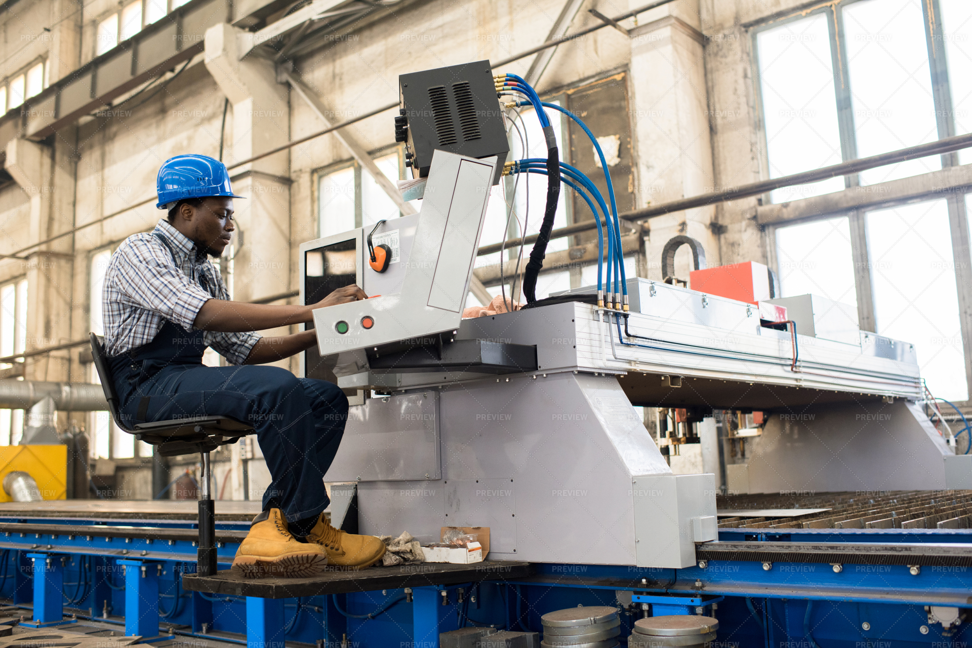 Machine Operator Wrapped up in Work